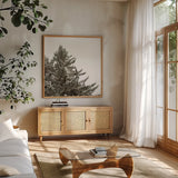 Snow on Treetops Crop by Sue Schlabach. Shown in a natural wood frame in a cozy modern living room. Available as an archival giclee rolled canvas, fine art paper, or poster print. SKU 60939a.
