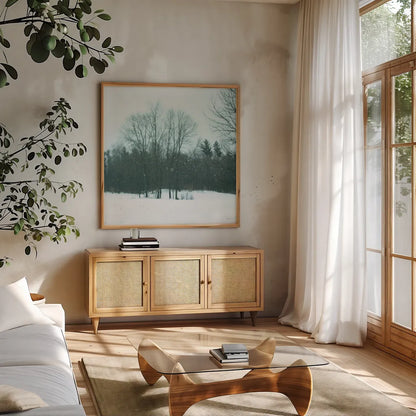 Snowfall by Sue Schlabach. Shown in a natural wood frame in a cozy modern living room. Available as an archival giclee rolled canvas, fine art paper, or poster print. SKU 60938a.