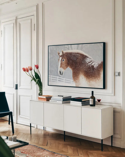 Snowy Draft Horse by Sue Schlabach. shown as a framed stretched canvas in a living room above a console. Available as a archival giclee rolled canvas, fine art paper, or poster print. SKU 75784i.