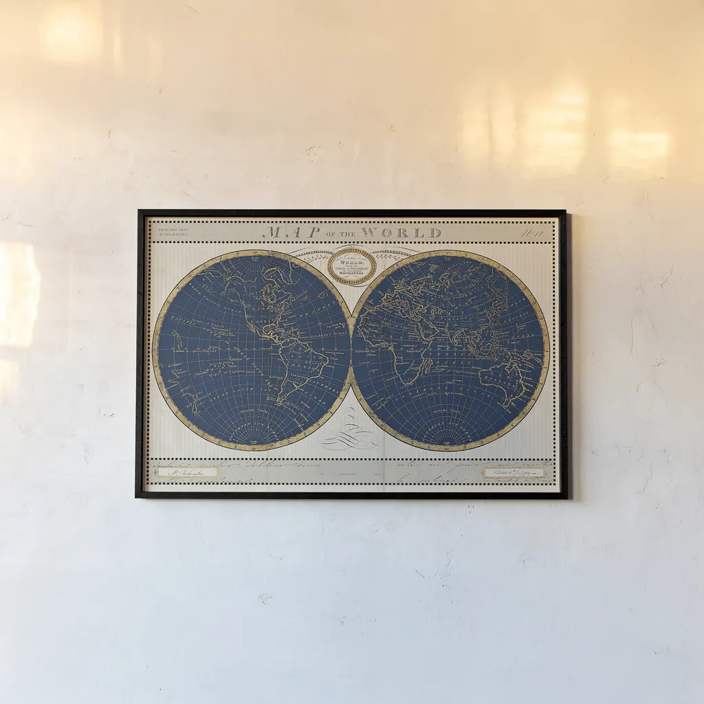 Torkingtons World Map Indigo Globes by Sue Schlabach. shown as a paper print in a black flame. Available as a archival giclee rolled canvas, fine art paper, or poster print. SKU 44846i.