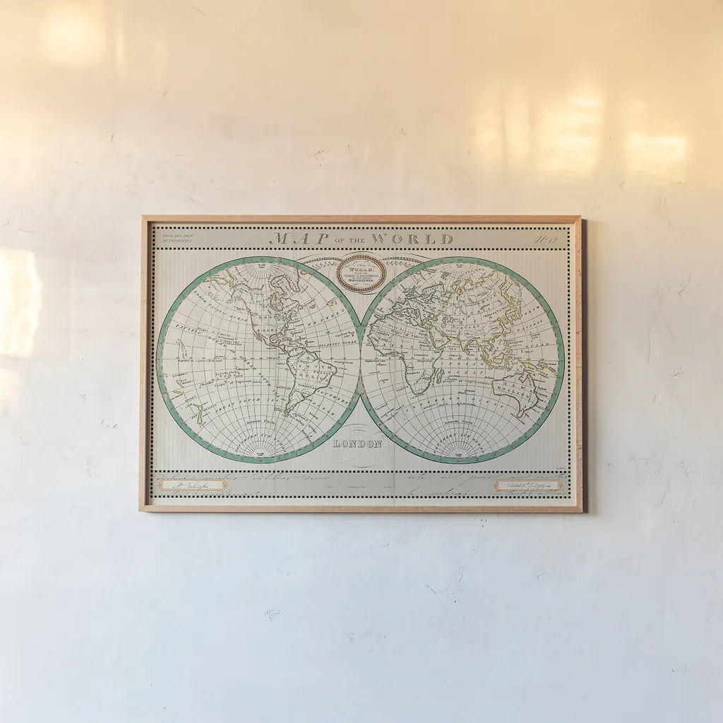 Torkingtons World Map Ivory by Sue Schlabach. shown as a paper print in a natural frame. Available as a archival giclee rolled canvas, fine art paper, or poster print. SKU 32376i.