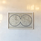 Torkingtons World Map with Indigo by Sue Schlabach. shown as a paper print in a white frame. Available as a archival giclee rolled canvas, fine art paper, or poster print. SKU 44845i.