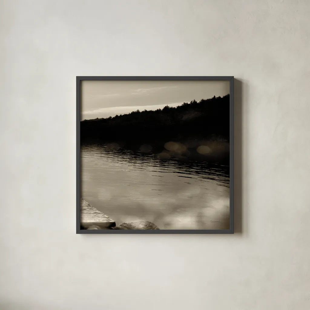 Twilight Dock IV Sepia by Sue Schlabach. Shown in a sleek black glass frame for a contemporary gallery look. Available as an archival giclee rolled canvas, fine art paper, or poster print. SKU 11293a.
