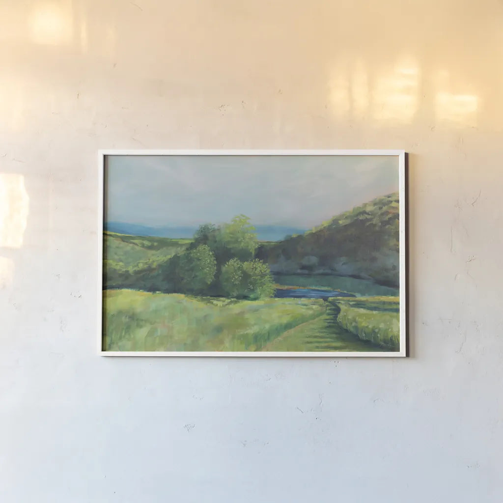 View of the Valley by Sue Schlabach. shown as a paper print in a white frame. Available as a archival giclee rolled canvas, fine art paper, or poster print. SKU 84230i.