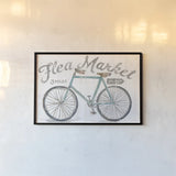 White Barn Flea Market I by Sue Schlabach. shown as a paper print in a black flame. Available as a archival giclee rolled canvas, fine art paper, or poster print. SKU 31765i.