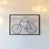 White Barn Flea Market I Blue Gray by Sue Schlabach. shown as a paper print in a black flame. Available as a archival giclee rolled canvas, fine art paper, or poster print. SKU 56465i.