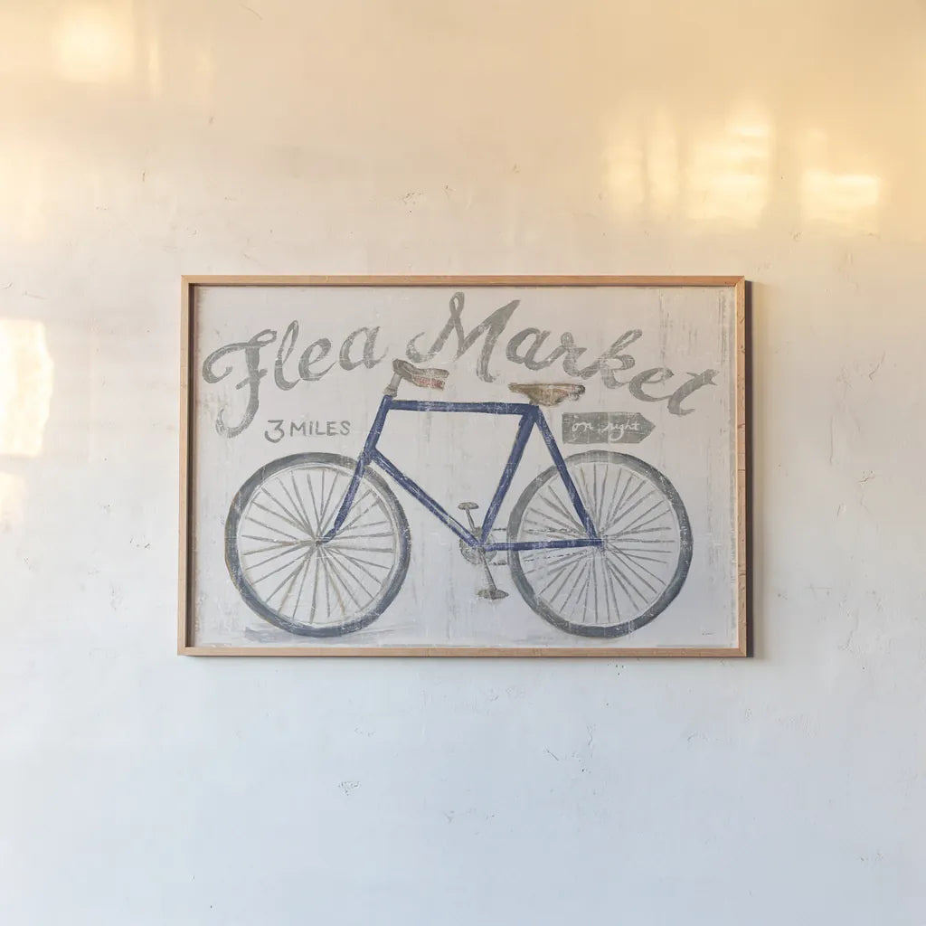 White Barn Flea Market I Blue Gray by Sue Schlabach. shown as a paper print in a natural frame. Available as a archival giclee rolled canvas, fine art paper, or poster print. SKU 56465i.