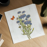 White Barn Flowers IX Sq by Sue Schlabach. Shown as a detailed flat fine art print, highlighting archival giclee quality. Available as an archival giclee rolled canvas, fine art paper, or poster print. SKU 56519a.