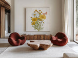 White Barn Flowers X Sq by Sue Schlabach. Shown as extra-large giant wall art in a modern living room. Available as an archival giclee rolled canvas, fine art paper, or poster print. SKU 56520a.