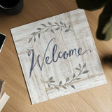Woodgrain Welcome by Sue Schlabach. Shown as a detailed flat fine art print, highlighting archival giclee quality. Available as an archival giclee rolled canvas, fine art paper, or poster print. SKU 68397a.