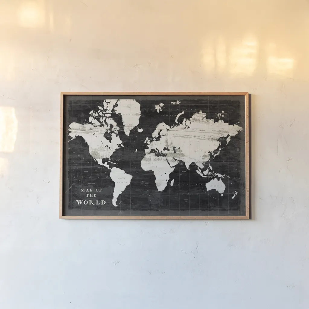 World Map Black by Sue Schlabach. shown as a paper print in a natural frame. Available as a archival giclee rolled canvas, fine art paper, or poster print. SKU 60389i.
