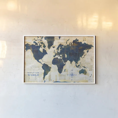 World Map Collage by Sue Schlabach. shown as a paper print in a white frame. Available as a archival giclee rolled canvas, fine art paper, or poster print. SKU 25667i.