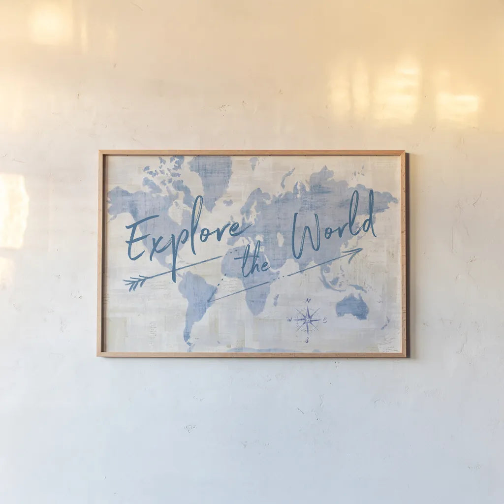 World Map Collage Explore by Sue Schlabach. shown as a paper print in a natural frame. Available as a archival giclee rolled canvas, fine art paper, or poster print. SKU 75340i.