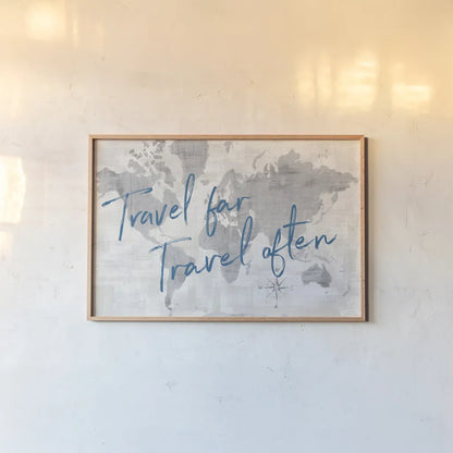 World Map Collage Travel by Sue Schlabach. shown as a paper print in a natural frame. Available as a archival giclee rolled canvas, fine art paper, or poster print. SKU 75341i.