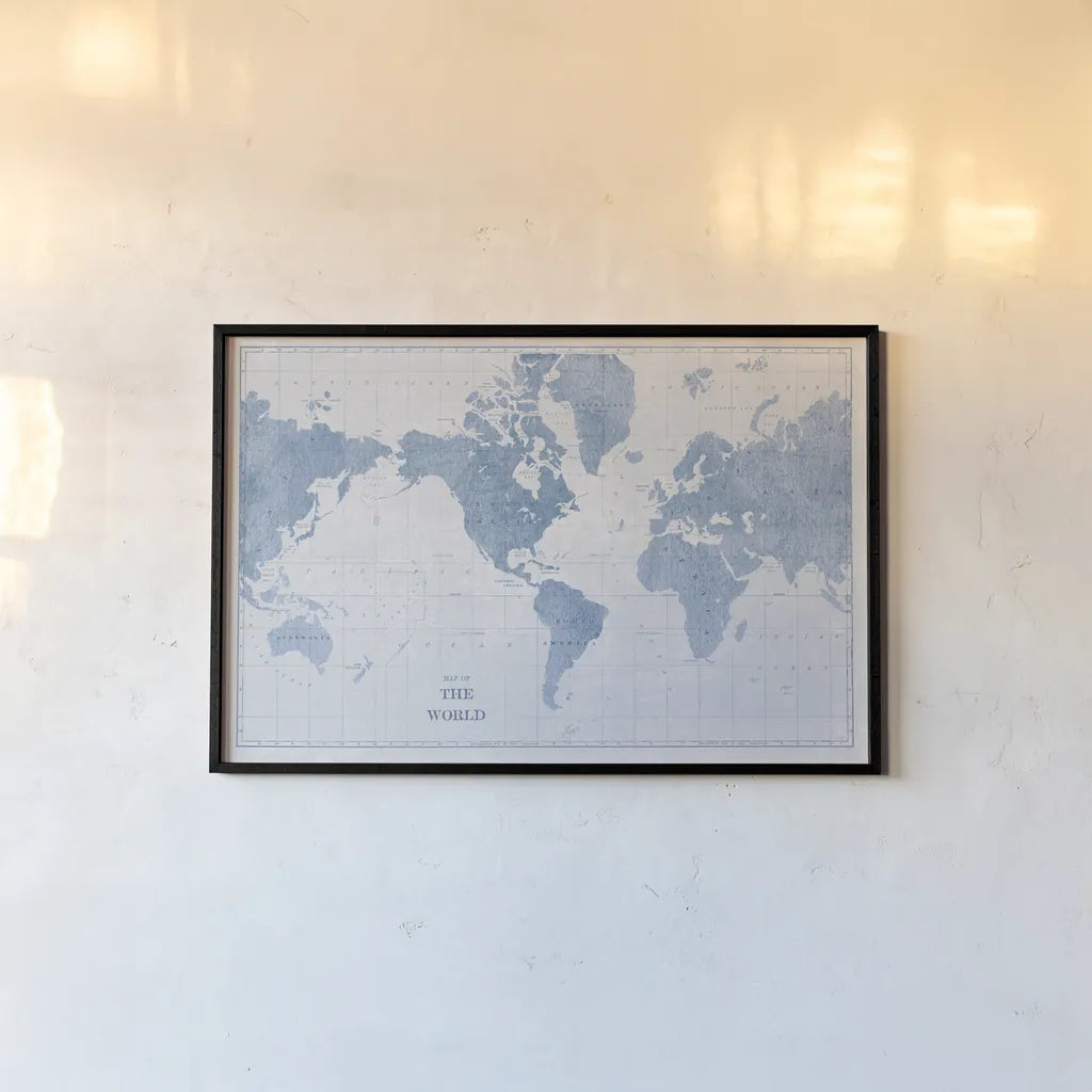 World Map White and Blue by Sue Schlabach. shown as a paper print in a black flame. Available as a archival giclee rolled canvas, fine art paper, or poster print. SKU 48172i.