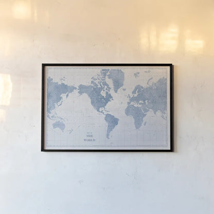 World Map White and Blue by Sue Schlabach. shown as a paper print in a black flame. Available as a archival giclee rolled canvas, fine art paper, or poster print. SKU 48172i.