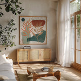 Abstract Blossom II by Veronique Charron. Shown in a natural wood frame in a cozy modern living room. Available as an archival giclee rolled canvas, fine art paper, or poster print. SKU 70897a.
