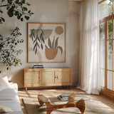 Botanical Form IV Neutral by Veronique Charron. Shown in a natural wood frame in a cozy modern living room. Available as an archival giclee rolled canvas, fine art paper, or poster print. SKU 71446a.
