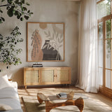 Botanical Form V Neutral by Veronique Charron. Shown in a natural wood frame in a cozy modern living room. Available as an archival giclee rolled canvas, fine art paper, or poster print. SKU 71447a.