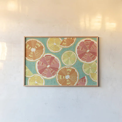 Citrus Splash XI by Veronique Charron. shown as a paper print in a natural frame. Available as a archival giclee rolled canvas, fine art paper, or poster print. SKU 38280i.