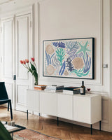 Coastal Currents I by Veronique Charron. shown as a framed stretched canvas in a living room above a console. Available as a archival giclee rolled canvas, fine art paper, or poster print. SKU 91763i.