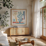 Coastal View IV by Veronique Charron. Shown in a natural wood frame in a cozy modern living room. Available as an archival giclee rolled canvas, fine art paper, or poster print. SKU 64979a.