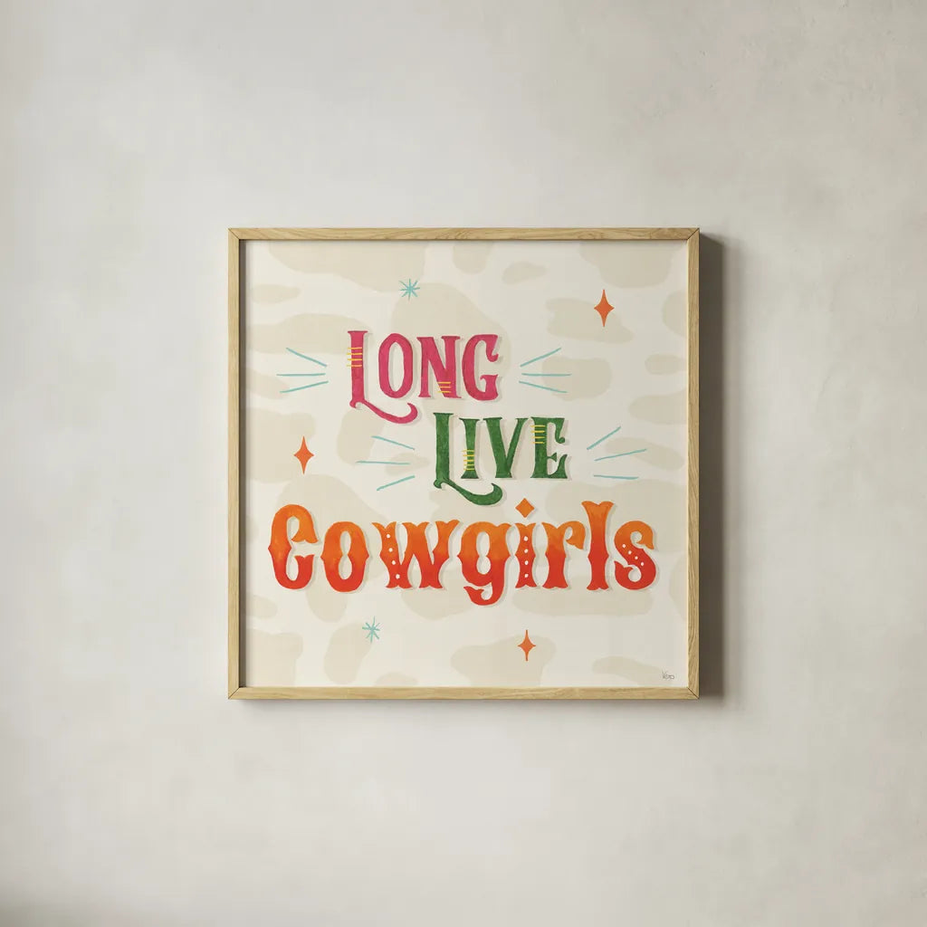 Cowgirl Club V by Veronique Charron. Shown in a natural wood glass frame for a timeless modern aesthetic. Available as an archival giclee rolled canvas, fine art paper, or poster print. SKU 92437a.