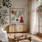 Deco Holiday III by Veronique Charron. Shown in a natural wood frame in a cozy modern living room. Available as an archival giclee rolled canvas, fine art paper, or poster print. SKU 83333a.