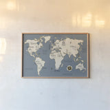 Doodles Map by Veronique Charron. shown as a paper print in a natural frame. Available as a archival giclee rolled canvas, fine art paper, or poster print. SKU 20588i.