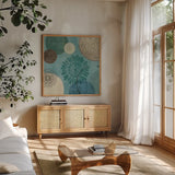 Flora Mood II by Veronique Charron. Shown in a natural wood frame in a cozy modern living room. Available as an archival giclee rolled canvas, fine art paper, or poster print. SKU 6104a.