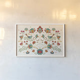 Folk Floral I by Veronique Charron. shown as a paper print in a white frame. Available as a archival giclee rolled canvas, fine art paper, or poster print. SKU 47019i.