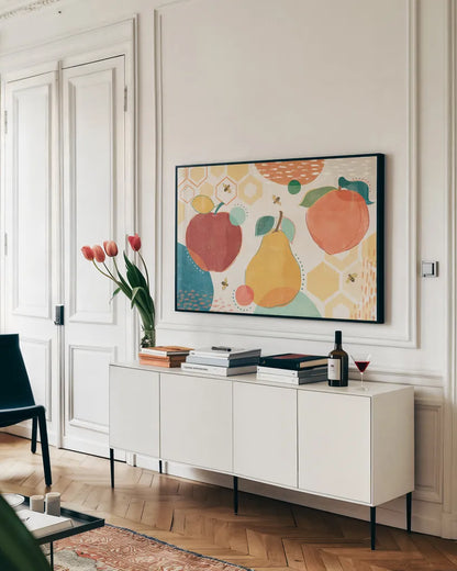 Fruit Frenzy I by Veronique Charron. shown as a framed stretched canvas in a living room above a console. Available as a archival giclee rolled canvas, fine art paper, or poster print. SKU 72393i.