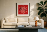 Holiday Charms I Red by Veronique Charron. Displayed in a glass frame with matte in a clean modern living room. Available as an archival giclee rolled canvas, fine art paper, or poster print. SKU 31971a.
