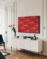 Holiday Charms V Red by Veronique Charron. shown as a framed stretched canvas in a living room above a console. Available as a archival giclee rolled canvas, fine art paper, or poster print. SKU 31975i.
