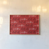 Holiday Charms V Red by Veronique Charron. shown as a paper print in a natural frame. Available as a archival giclee rolled canvas, fine art paper, or poster print. SKU 31975i.