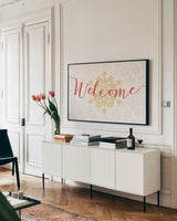 Holiday Charms VI by Veronique Charron. shown as a framed stretched canvas in a living room above a console. Available as a archival giclee rolled canvas, fine art paper, or poster print. SKU 31970i.