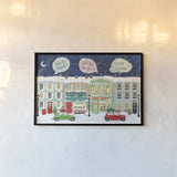 Hometown Holiday I by Veronique Charron. shown as a paper print in a black flame. Available as a archival giclee rolled canvas, fine art paper, or poster print. SKU 60896i.