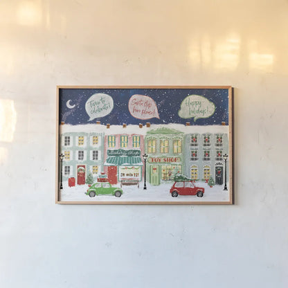 Hometown Holiday I by Veronique Charron. shown as a paper print in a natural frame. Available as a archival giclee rolled canvas, fine art paper, or poster print. SKU 60896i.