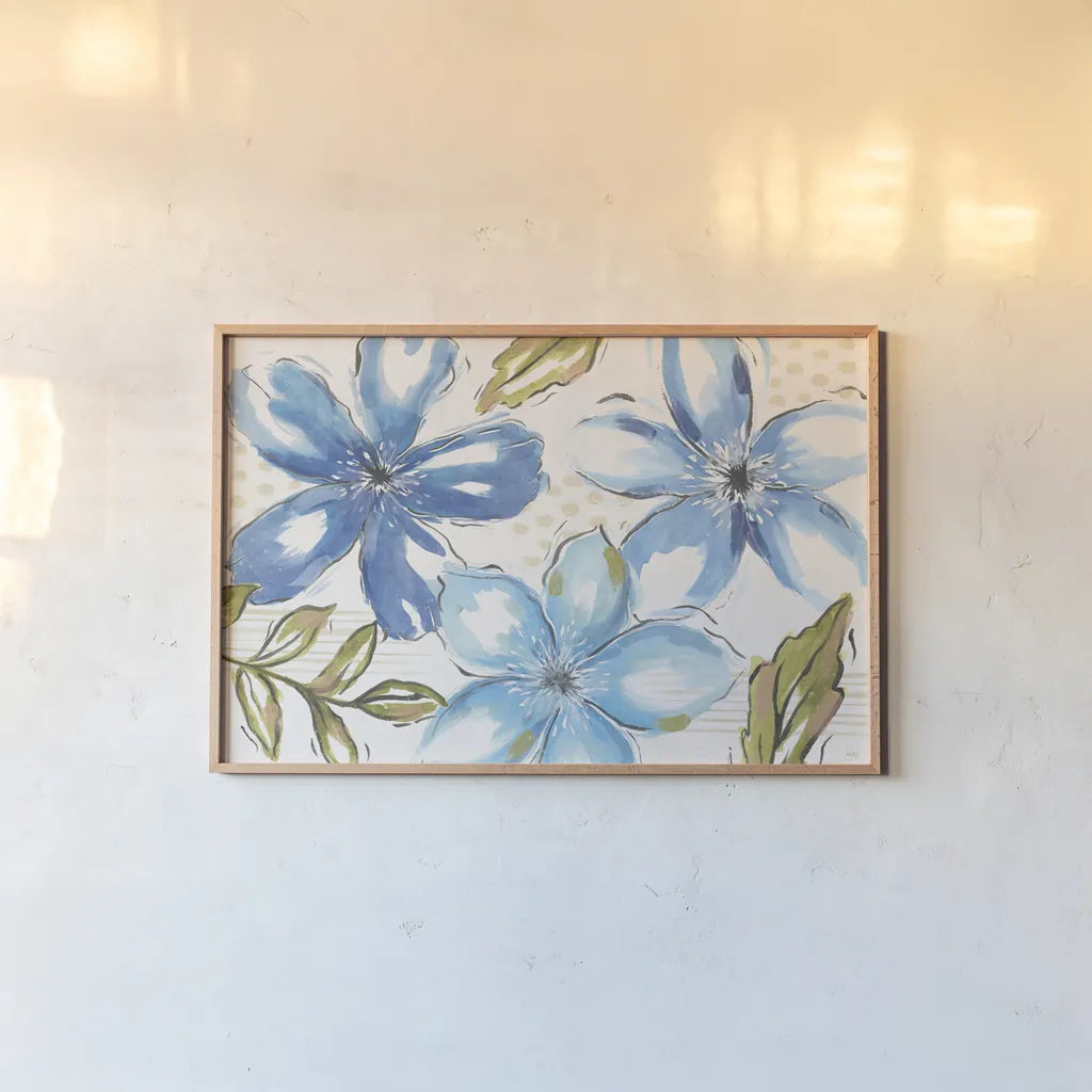 Indigo Tones I by Veronique Charron. shown as a paper print in a natural frame. Available as a archival giclee rolled canvas, fine art paper, or poster print. SKU 84365i.