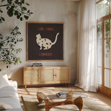 Otomi Cats V Dark by Veronique Charron. Shown in a natural wood frame in a cozy modern living room. Available as an archival giclee rolled canvas, fine art paper, or poster print. SKU 43845a.