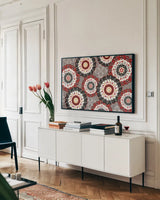 Otomi Farm XV by Veronique Charron. shown as a framed stretched canvas in a living room above a console. Available as a archival giclee rolled canvas, fine art paper, or poster print. SKU 42394i.