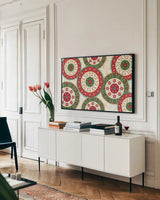 Otomi Holiday X by Veronique Charron. shown as a framed stretched canvas in a living room above a console. Available as a archival giclee rolled canvas, fine art paper, or poster print. SKU 45523i.