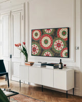 Otomi Holiday X Black by Veronique Charron. shown as a framed stretched canvas in a living room above a console. Available as a archival giclee rolled canvas, fine art paper, or poster print. SKU 45531i.