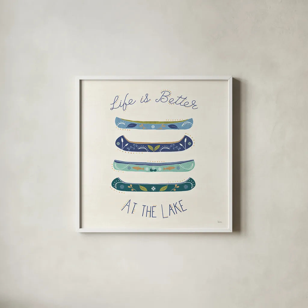 Otomi Lake VI Canoes by Veronique Charron. Shown in a crisp white glass frame for a clean and minimalist style. Available as an archival giclee rolled canvas, fine art paper, or poster print. SKU 48353a.