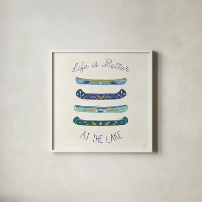 Otomi Lake VI Canoes by Veronique Charron. Shown in a crisp white glass frame for a clean and minimalist style. Available as an archival giclee rolled canvas, fine art paper, or poster print. SKU 48353a.