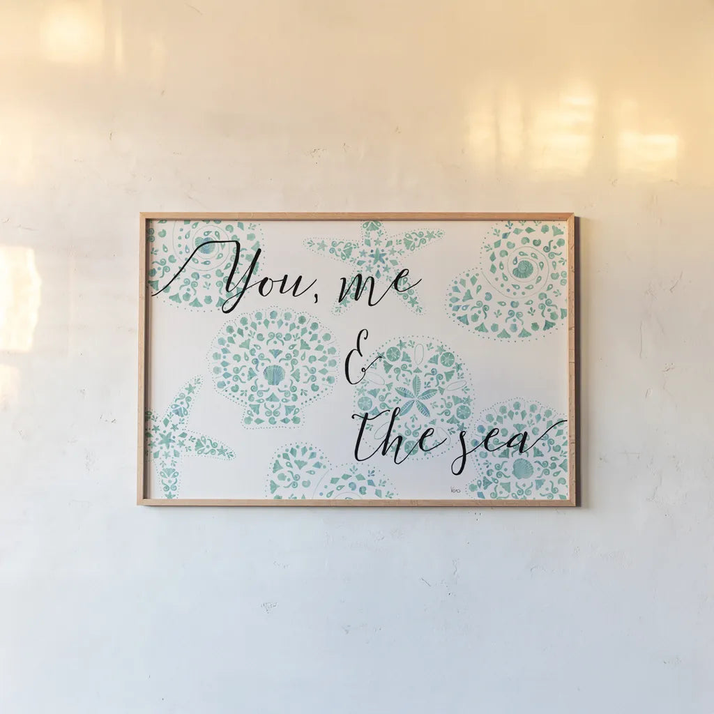 Sea Charms VIII Teal by Veronique Charron. shown as a paper print in a natural frame. Available as a archival giclee rolled canvas, fine art paper, or poster print. SKU 32007i.