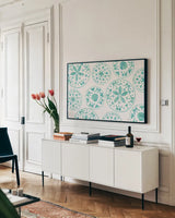 Sea Charms X Teal by Veronique Charron. shown as a framed stretched canvas in a living room above a console. Available as a archival giclee rolled canvas, fine art paper, or poster print. SKU 32009i.