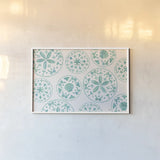 Sea Charms X Teal by Veronique Charron. shown as a paper print in a white frame. Available as a archival giclee rolled canvas, fine art paper, or poster print. SKU 32009i.