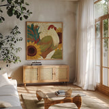 Spice Roosters I by Veronique Charron. Shown in a natural wood frame in a cozy modern living room. Available as an archival giclee rolled canvas, fine art paper, or poster print. SKU 14110a.