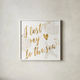 To the Sea I by Veronique Charron. Shown in a crisp white glass frame for a clean and minimalist style. Available as an archival giclee rolled canvas, fine art paper, or poster print. SKU 29876a.